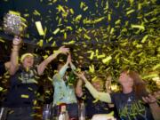 Seahawks fans celebrate at Big Al's at the end of Super Bowl XLVIII on Sunday.