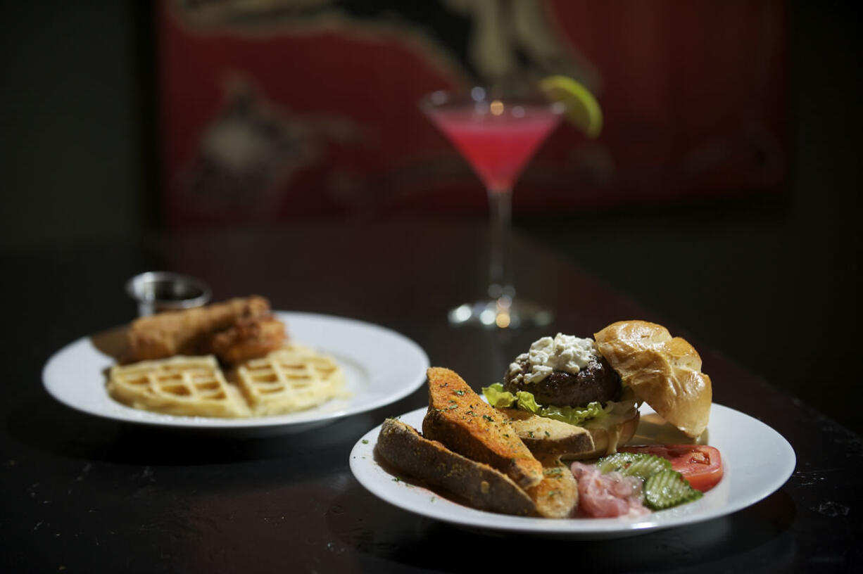 The Low Bar Burger and the Waffle With Fried Chicken at Low Bar in downtown Vancouver.