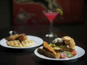 The Low Bar Burger and the Waffle With Fried Chicken at Low Bar in downtown Vancouver.