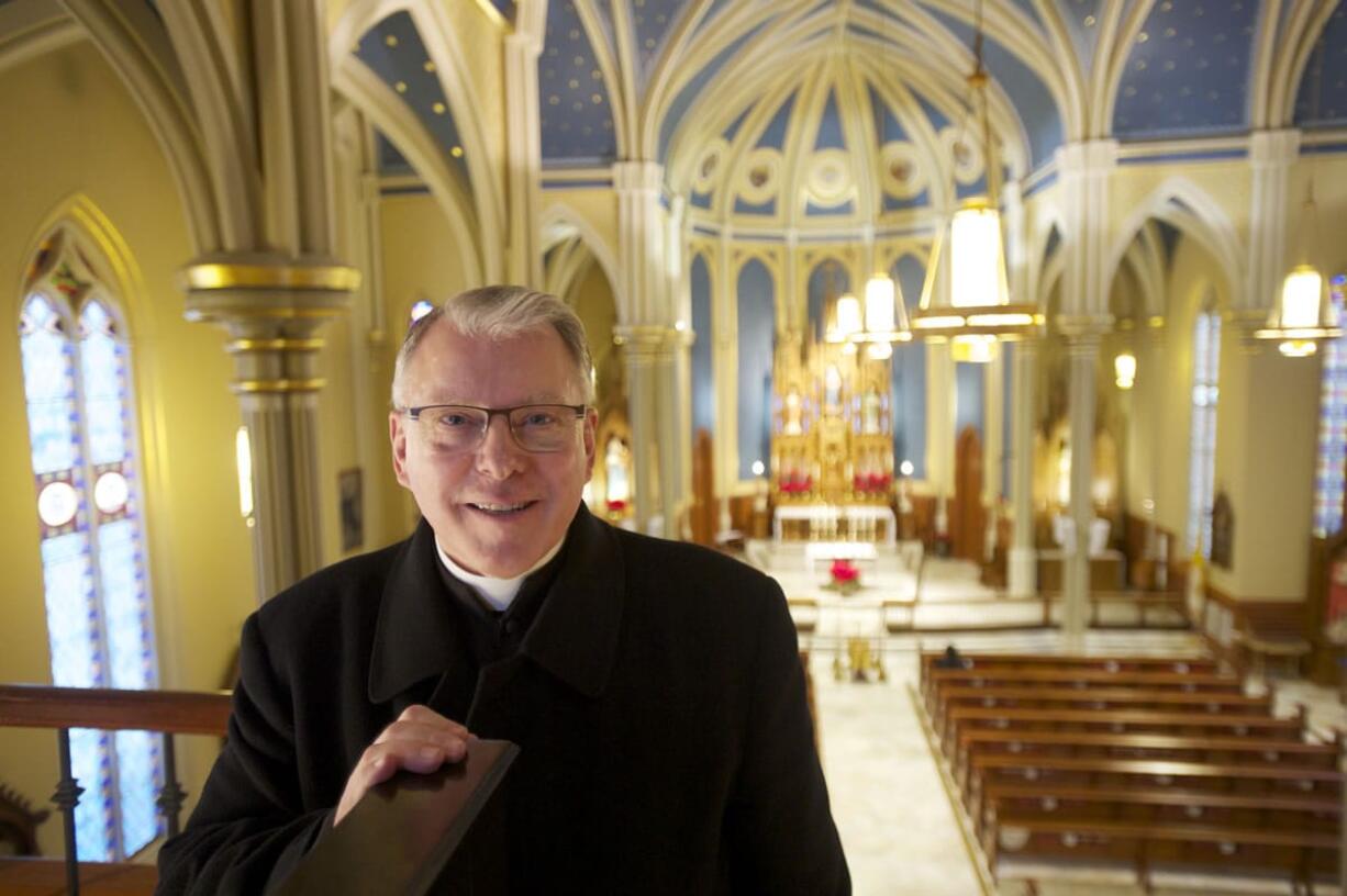 Photos by Steven Lane/The Columbian
The Rev. William Harris, pastor of the Proto-Cathedral of St. James the Greater, says the downtown parish serves more than 700 families.