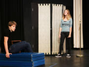 Brendan Groat stars as Scrooge and Sarah Wren as one of his guilt-tripping ghosts during a rehearsal for Battle Ground High School&#039;s upcoming adaptation of &quot;A Christmas Carol.&quot;