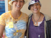 Ridgefield: Cancer survivors and friends Jennifer Conkey, right, of Ridgefield and Renee Dieffenderfer of Gresham, Ore., wear stylish hats, similar to the more than 100 they recently donated to patients undergoing chemotherapy at local treatment centers.