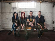 Christian rock band Skillet, from left, Korey Cooper, Jen Ledger, John Cooper and Seth Morrison, will perform Jan.