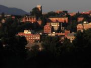 Washington State University's Pullman campus glows on its hill.