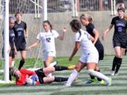 Carroll College goalkeeper Jamie Carter makes another stop.