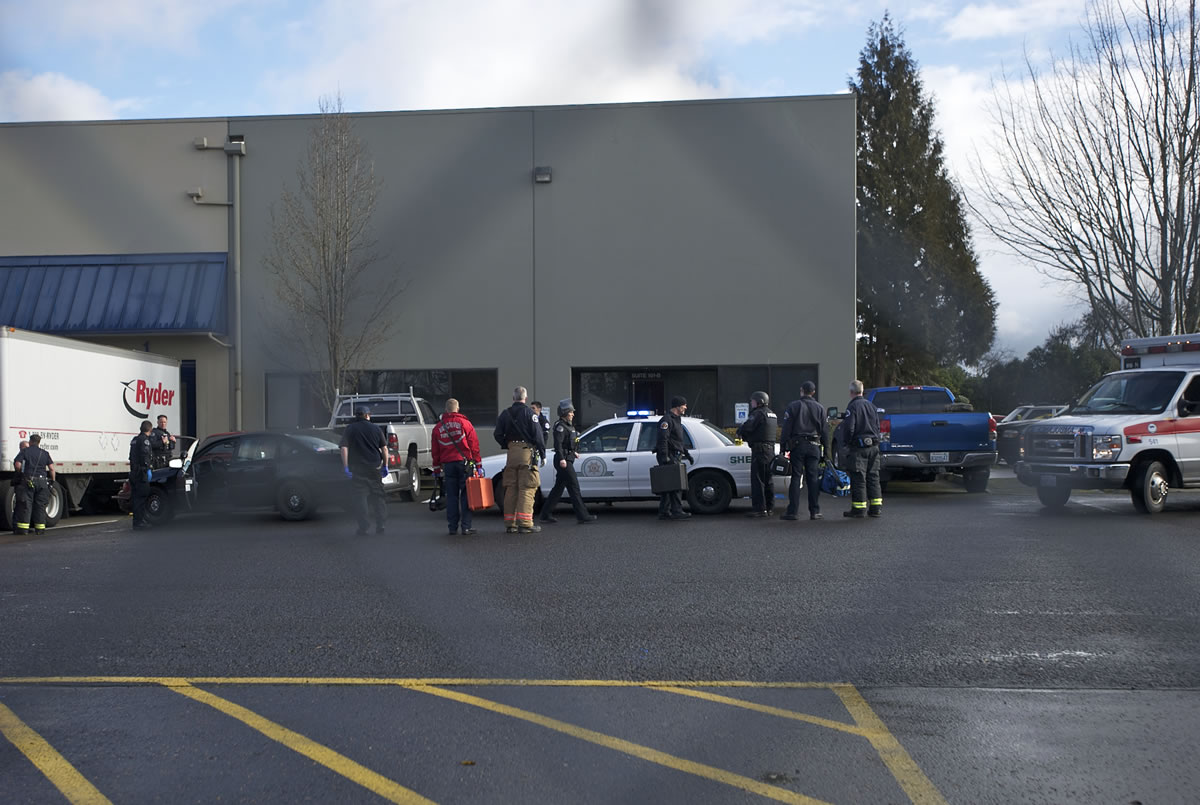 Police secure the scene of a shooting at a business park in Fruit Valley on Monday February 3, 2014.