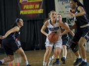 Gonzaga Prep's Laura Stockton goes to the hoop against Skyview during the second half of an opening round game in the Class 4A state tournament at the Tacoma Dome on Thursday March 6, 2014.