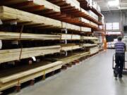 A customer walks past building products at a Home Depot store in Nashville, Tenn., in August 2012. The growing strength of Clark County's housing recovery and a shot of consumer confidence delivered a 9.7 percent increase in local retail sales in the spring, according to a Wednesday report.