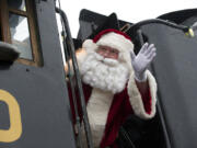 Santa Claus arrives on the SP&amp;S 700 steam locomotive, Saturday, December 15, 2012.