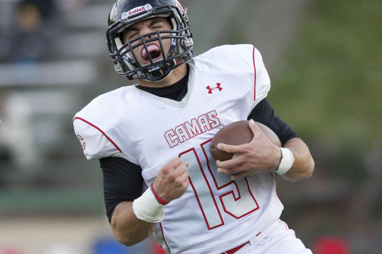 Camas linebacker Michael DiGenova returns a fumble for a score against Evergreen on Oct.