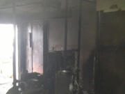 A fire gutted the garage in a La Center home Thursday night.