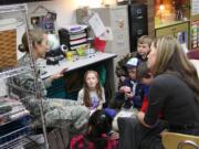 Woodland: During a Veterans Day visit to Melissa Sanders' third-grade class at Woodland Primary School, Master Sgt.