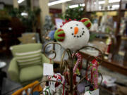 Holiday ornaments are among the gift ideas at Divine Consign, which donates a portion of proceeds to local charities.