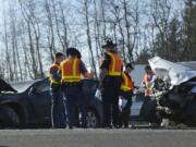 Emergency crews respond to a head on collision caused by a wrong way driver on I-5 north, south of the Battle Ground exit, Friday, February 28, 2014.