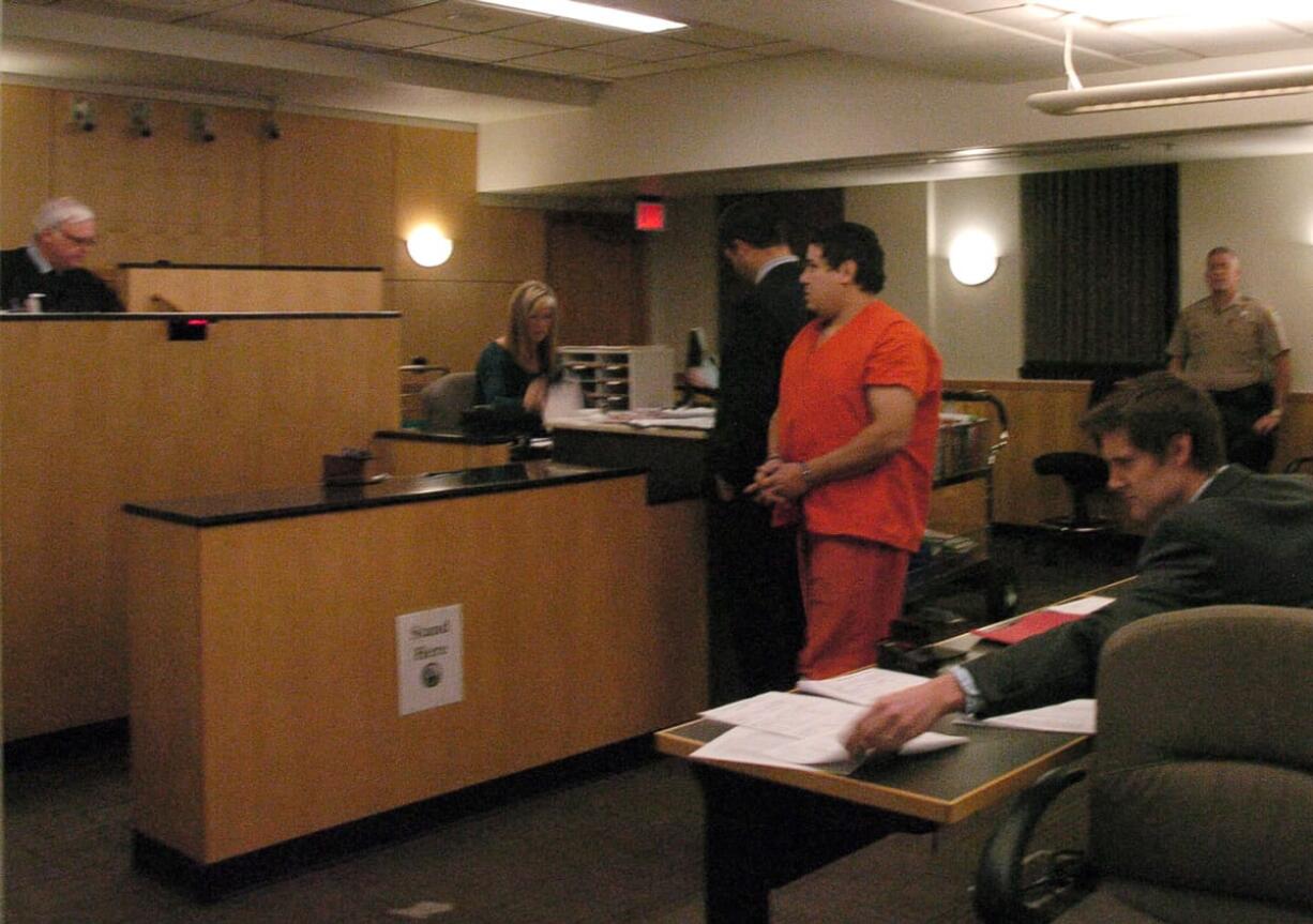 Marcus Morrison appears Monday in Clark County Superior Court on suspicion of attempting to murder his girlfriend and best friend after finding them in bed together.