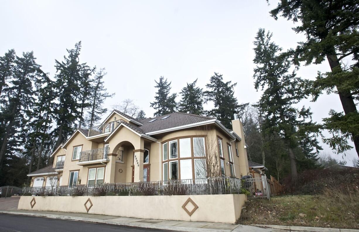 The city of Vancouver has sued Daniel and Lidia Grozav, claiming numerous violations of environmental and nuisance codes at their property on French Road.