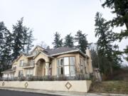 The city of Vancouver has sued Daniel and Lidia Grozav, claiming numerous violations of environmental and nuisance codes at their property on French Road.