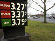 Fuel prices are listed on a sign at the Fred Meyers on Southeast 164th Avenue on Monday.