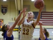 Prairie's Nicole Goecke drives to the basket against Columbia River for two of her 13 points Friday.