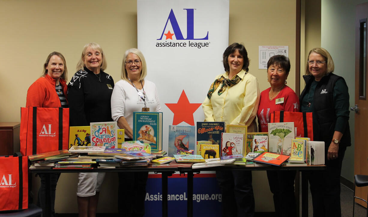 Central Vancouver: The Assistance League of Southwest Washington donated 166 books to Innovative Services Northwest, and League volunteers delivered the books themselves.