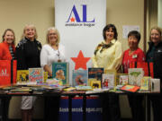 Central Vancouver: The Assistance League of Southwest Washington donated 166 books to Innovative Services Northwest, and League volunteers delivered the books themselves.