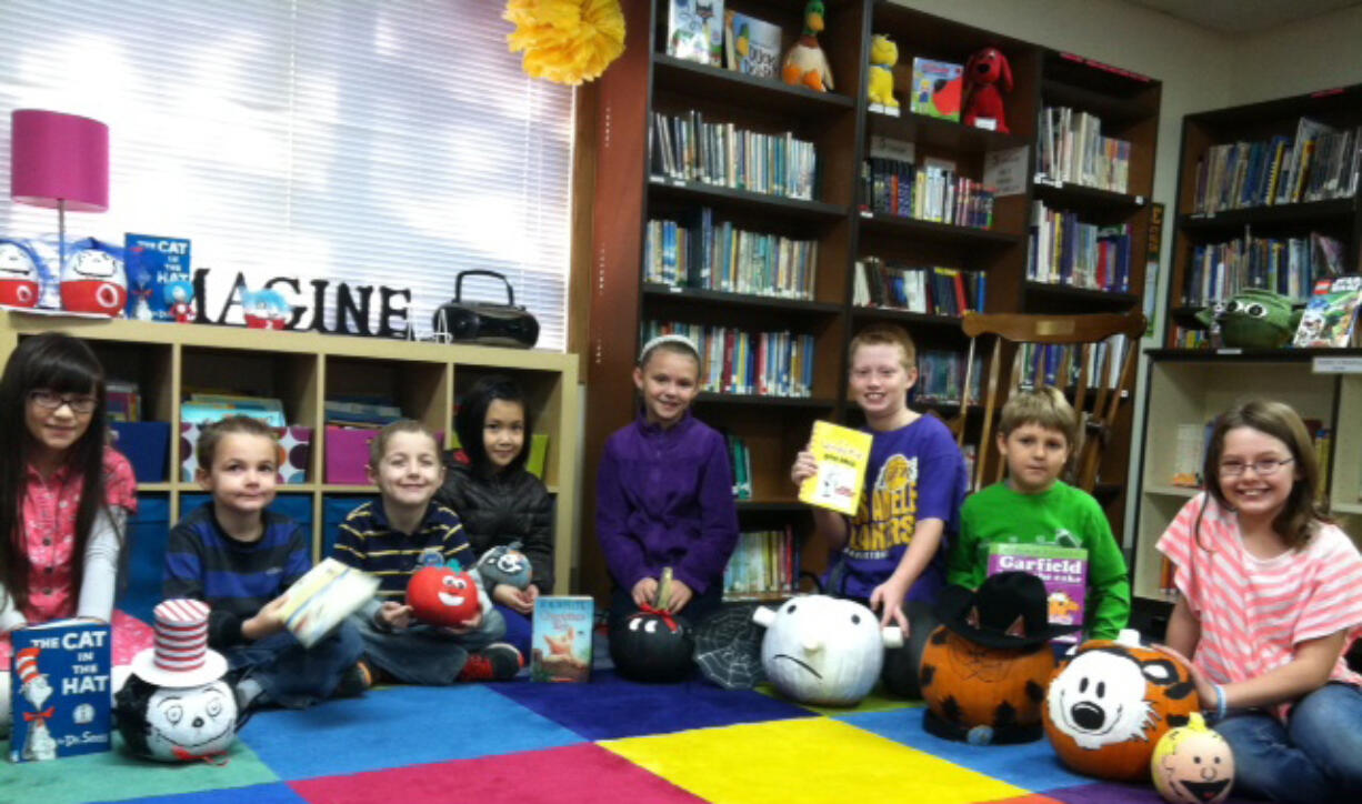 Sunnyside: Cornerstone Christian Academy students show off pumpkins they transformed into characters from their favorite books on Oct.