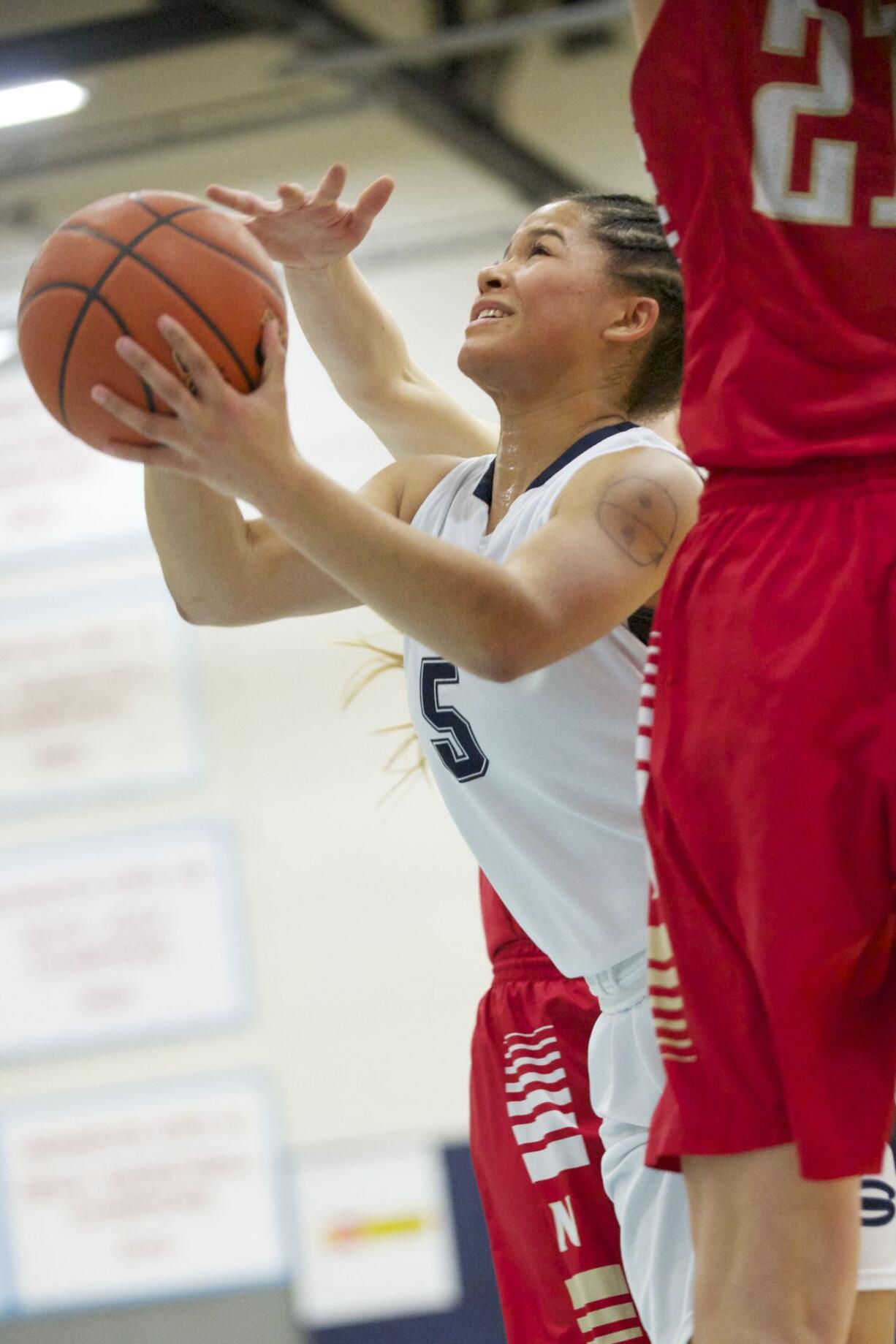 Skyview's Aubrey Ward-El makes a move to the basket against Newport (Bellevue) at the Class 4A Regional basketball game at Mark Morris High School in Longview, Saturday, March 1, 2014.