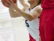 Skyview's Aubrey Ward-El makes a move to the basket against Newport (Bellevue) at the Class 4A Regional basketball game at Mark Morris High School in Longview, Saturday, March 1, 2014.