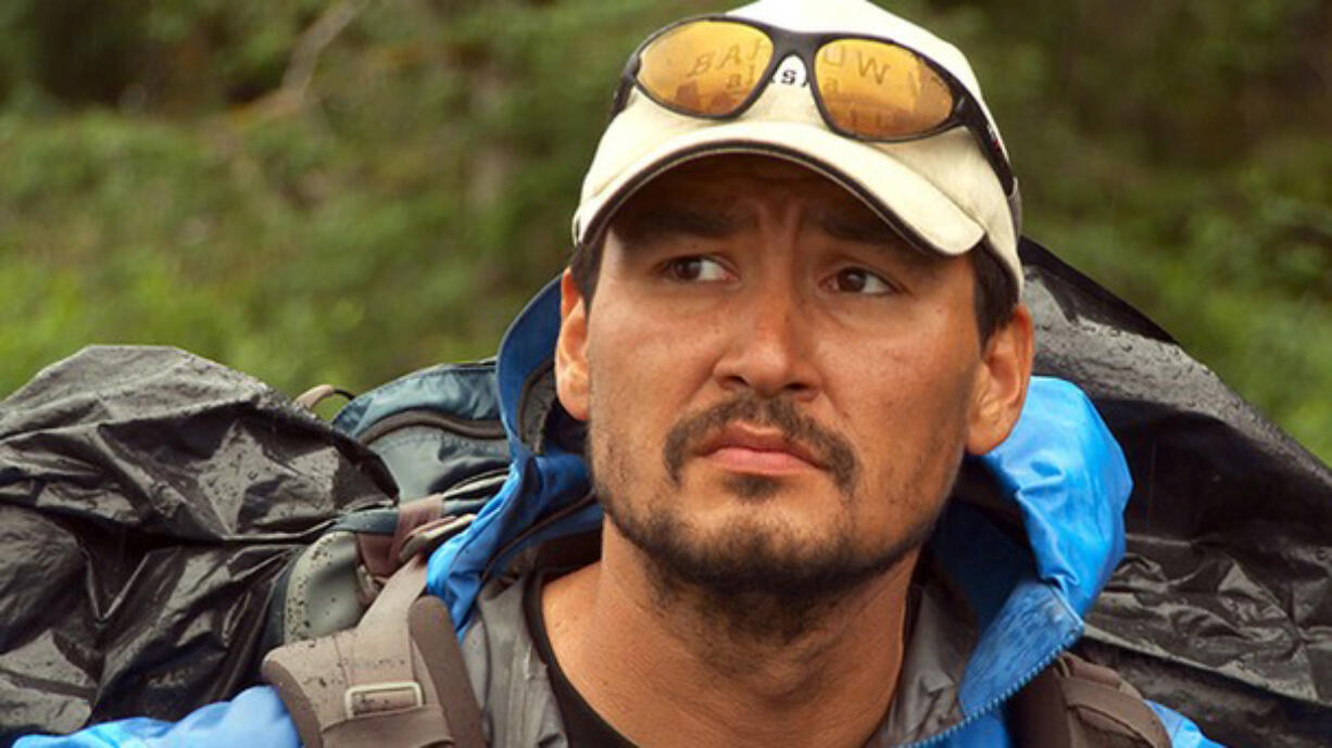 Eddie Ahyakak looks into the Alaskan wilderness during filming of &quot;Ultimate Survival Alaska&quot; for the National Geographic Channel.