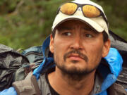 Eddie Ahyakak looks into the Alaskan wilderness during filming of &quot;Ultimate Survival Alaska&quot; for the National Geographic Channel.