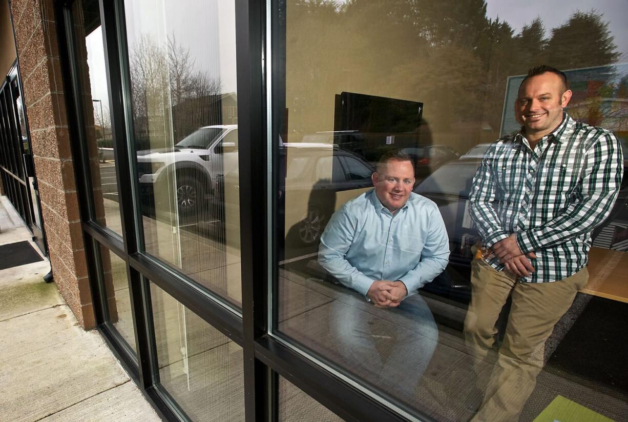 Co-Founders of Fuel Medical Shawn Parker, left, and Brendan Ford have purchased an auto servicing center in downtown Camas, which they plan to remodel into office space for their growing company.