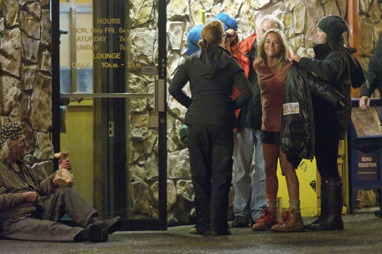 Award-winning actress Reese Witherspoon takes a break outside the Elbow Room at Paul's Restaurant in Vancouver's Uptown Village during Nov.