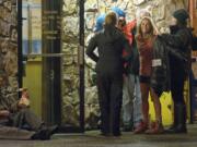 Award-winning actress Reese Witherspoon takes a break outside the Elbow Room at Paul's Restaurant in Vancouver's Uptown Village during Nov.