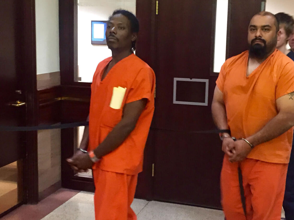 Edward E. Frye (left) makes a first appearance Monday in Clark County Superior Court on suspicion of first-degree assault and drive-by shooting.