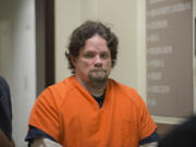 Duane C. Abbott, the driver who struck and killed 7-year-old Cadence Boyer as she was trick-or-treating Halloween night 2014 in Vancouver, walks through the hallway of the Clark County Courthouse in November 2015.