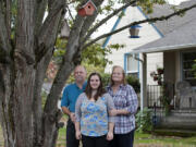 Amreal Presler, center, had to go to Seattle for oral surgery because she couldn&#039;t find a local dental surgeon who accepts Medicaid. With her are Paul and Susan Presler.