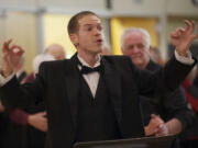 Cary Pederson directs The Beacock Music Swing Band at the fifth annual Swinging in the New Year's Eve Dance on Tuesday.