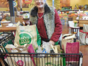 West Minnehaha: Marlice Bryant, winner of The Columbian's recent recipe contest, shows off her $500 worth of winnings from Whole Foods, which she said she will donate to help feed the hungry.