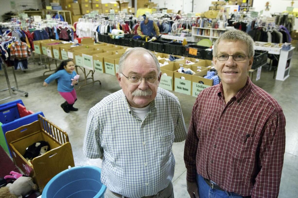 Dick Lauer, left, is the outgoing executive director of the Vancouver conference of St. Vincent de Paul, a Catholic lay charity. As of Jan.