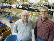 Dick Lauer, left, is the outgoing executive director of the Vancouver conference of St. Vincent de Paul, a Catholic lay charity. As of Jan.