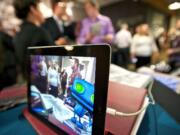 During Thursday evening's &quot;Digital Innovation Showcase,&quot; an iPad displayed an &quot;augmented reality&quot; where a tablet or smartphone reads a 2D image and creates a 3D environment.