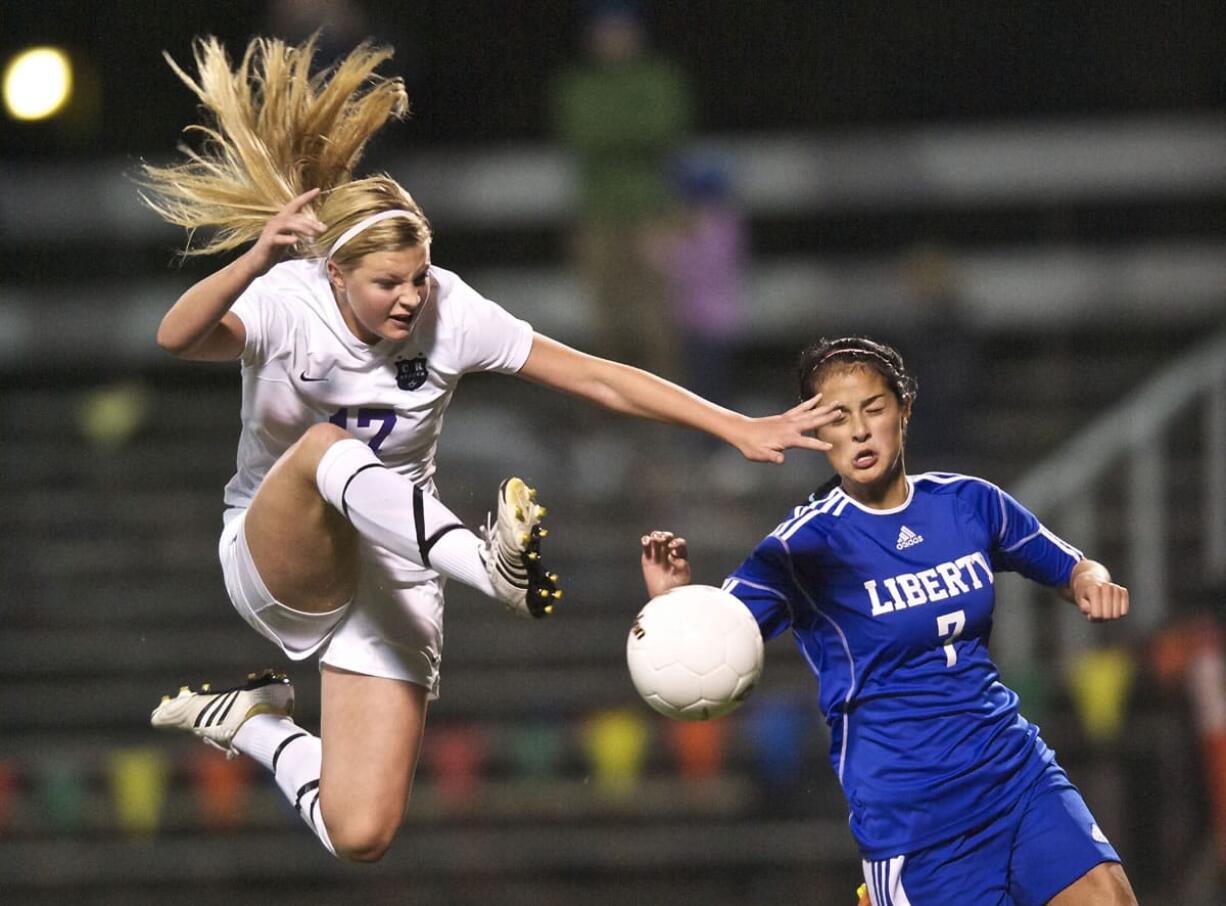 Columbia River's Madison Reynolds puts a shot on goal late in the second half against Liberty in a first-round state playoff game at Kiggins Bowl.