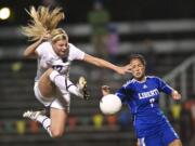 Columbia River's Madison Reynolds puts a shot on goal late in the second half against Liberty in a first-round state playoff game at Kiggins Bowl.