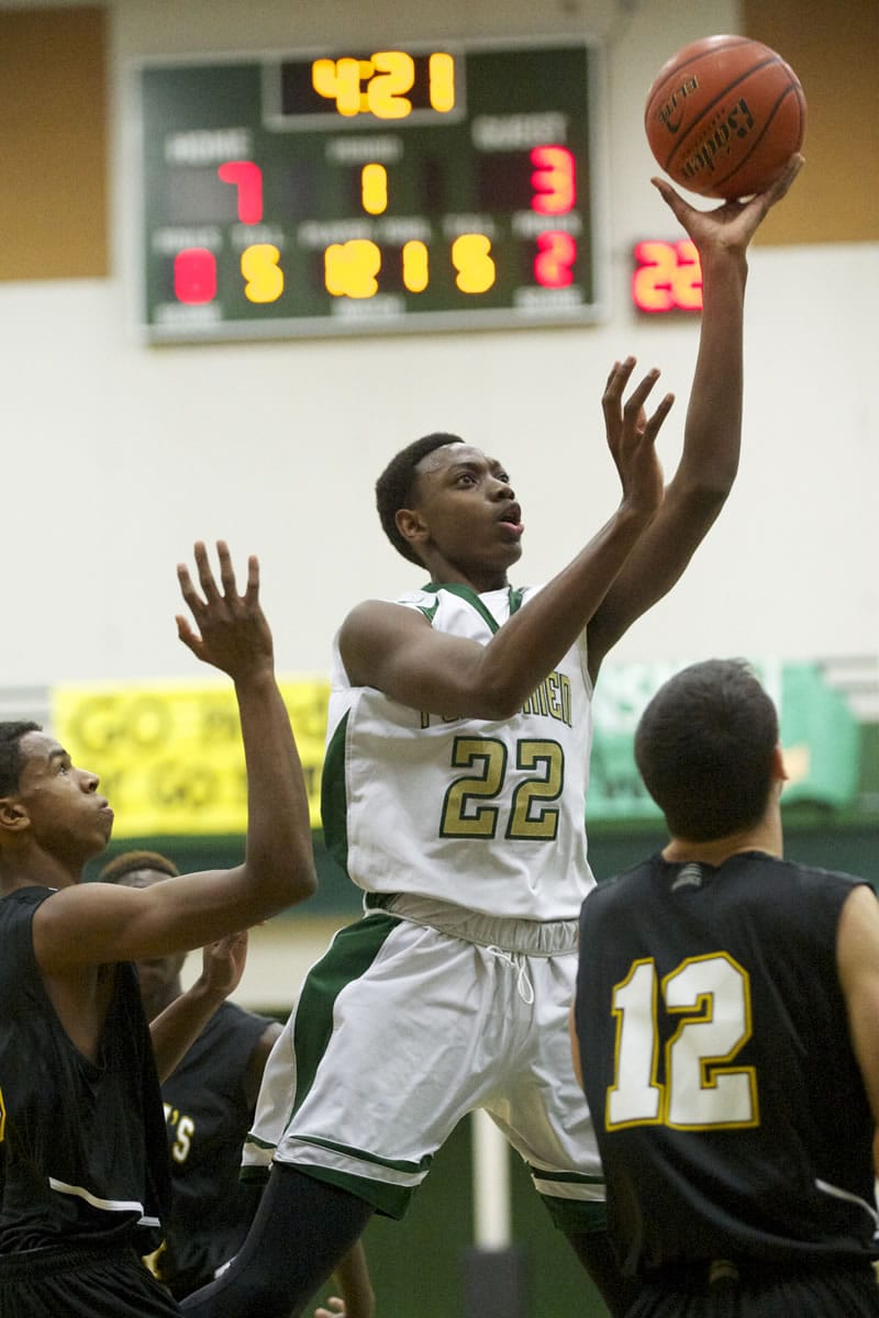 Evergreen High School junior Robert Franks goes to the basket during a game last week against Hudson's Bay.