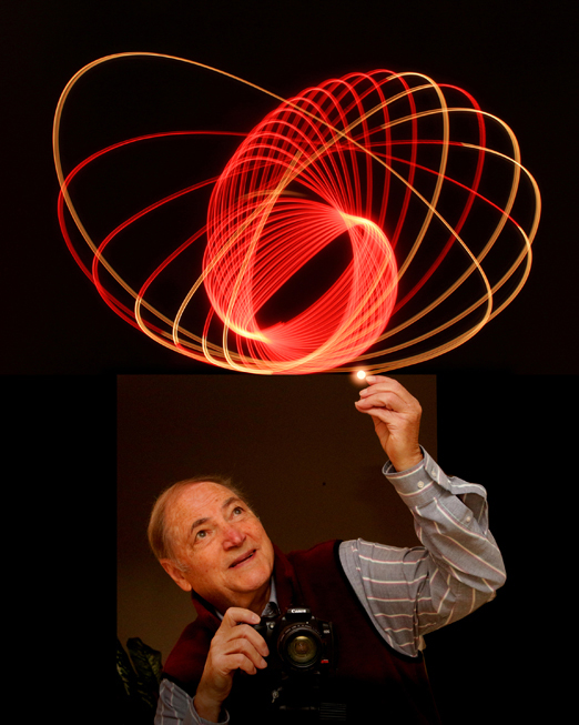 This is a tricky composite image: the self-portrait of Ray Klein was taken in an instant while the lines overhead are a 30-second exposure of a swinging light bulb.