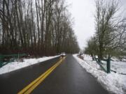 This new gate at Milepost 10 of Lower River Road is still open, but some day officials with the Washington Department of Transportation will deem the road unsafe and close the gate permanently.