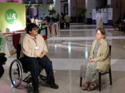 Lynnae Ruttledge
Lynnae Ruttledge, right, and a young man named Abdulaziz Al-Mutairi, who has muscular dystrophy, are interviewed for Kuwaiti television news in early December.