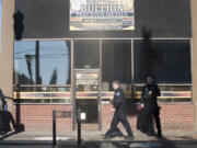 Police at the scene of a shooting at a shop in downtown Vancouver, Wednesday November 25, 2015. Early reports indicated one fatality, according to emergency radio traffic.