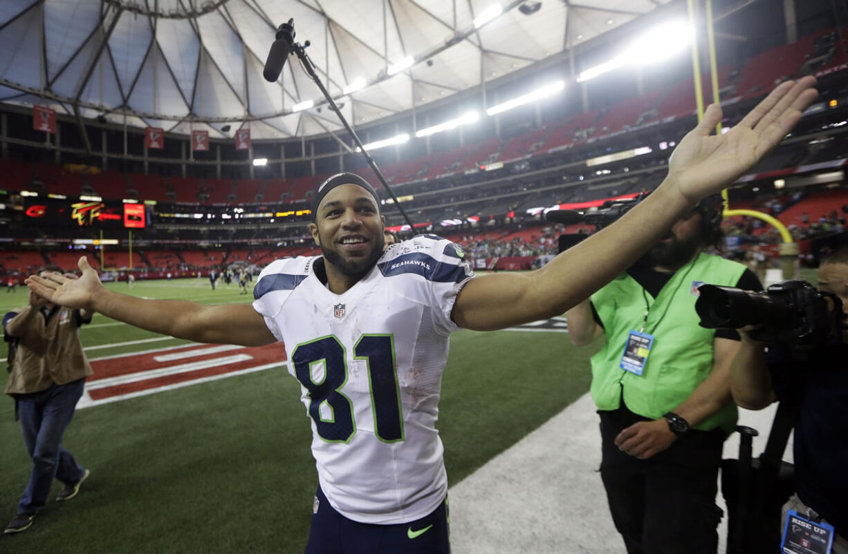 Seattle Seahawks wide receiver Golden Tate (81) celebrates after the second half of an NFL football game against the Atlanta Falcons, Sunday, Nov. 10, 2013, in Atlanta. Seattle Seahawks won 33-10.