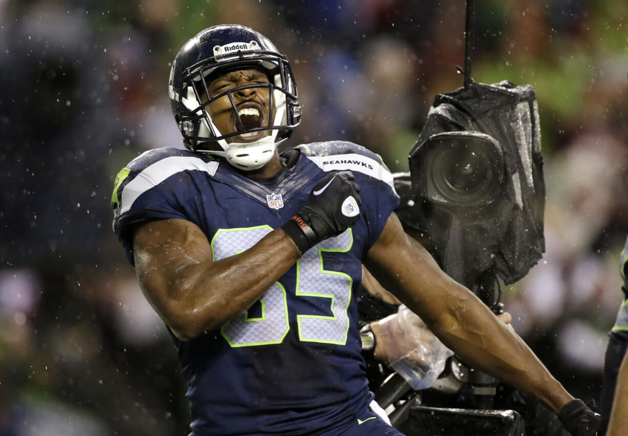 Anthony McCoy reacts after scoring against the San Francisco 49ers during the 2012 season.